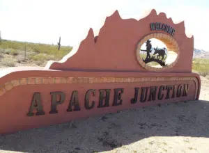 Welcome sign for Apache Junction, Arizona, indicating a local service area for professional plumbing company.