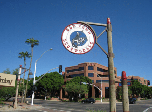 Street scene with a sign in Scottsdale, Arizona, identifying the area for our local plumbing services.